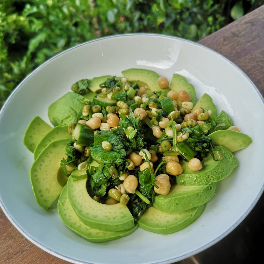 Benefits of yogic diet: Avocado cilantro salad with sprouted mung beans and chickpeas